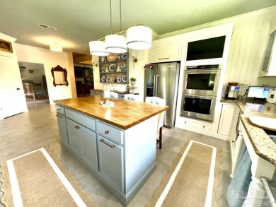 This stunning custom built 2 story brick home on 9th fairway in on Scenic Hills Country Club in Florida - for sale on GolfHomes.com, golf home, golf lot