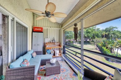 Remodeled 2/2 condo that lives like a home - Impact windows and on Woodmont Country Club in Florida - for sale on GolfHomes.com, golf home, golf lot