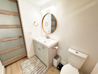 Updated top-floor 2BD/2BA condo with stunning lake views in the on Pine Island Ridge Country Club in Florida - for sale on GolfHomes.com, golf home, golf lot