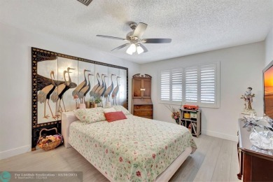 Remodeled 2/2 condo that lives like a home - Impact windows and on Woodmont Country Club in Florida - for sale on GolfHomes.com, golf home, golf lot