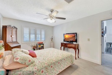 Remodeled 2/2 condo that lives like a home - Impact windows and on Woodmont Country Club in Florida - for sale on GolfHomes.com, golf home, golf lot