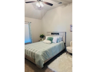 This beautifully designed home offers a blend of modern on Pecan Plantation Country Club in Texas - for sale on GolfHomes.com, golf home, golf lot