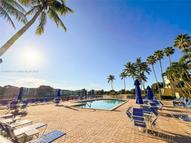 Updated top-floor 2BD/2BA condo with stunning lake views in the on Pine Island Ridge Country Club in Florida - for sale on GolfHomes.com, golf home, golf lot