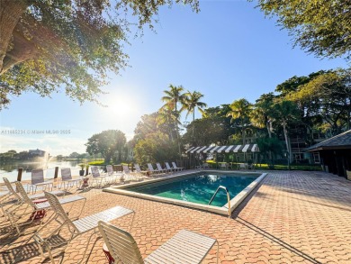 Updated top-floor 2BD/2BA condo with stunning lake views in the on Pine Island Ridge Country Club in Florida - for sale on GolfHomes.com, golf home, golf lot