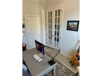 This beautifully designed home offers a blend of modern on Pecan Plantation Country Club in Texas - for sale on GolfHomes.com, golf home, golf lot