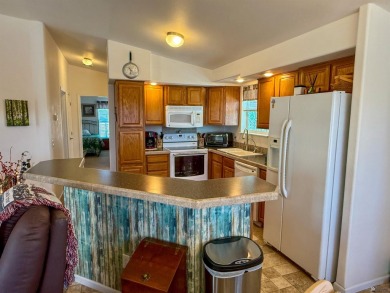 Welcome home to your charming desert retreat! This delightful on Las Barrancas Golf Course in Arizona - for sale on GolfHomes.com, golf home, golf lot