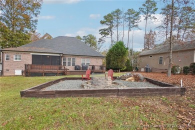 STUNNING CUSTOM HOME located on the 12th hole of Carolina Trace on Carolina Trace Country Club in North Carolina - for sale on GolfHomes.com, golf home, golf lot