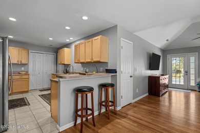 This attractive three-bedroom, two-bath brick ranch offers a on Masonboro Country Club in North Carolina - for sale on GolfHomes.com, golf home, golf lot