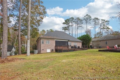 STUNNING CUSTOM HOME located on the 12th hole of Carolina Trace on Carolina Trace Country Club in North Carolina - for sale on GolfHomes.com, golf home, golf lot