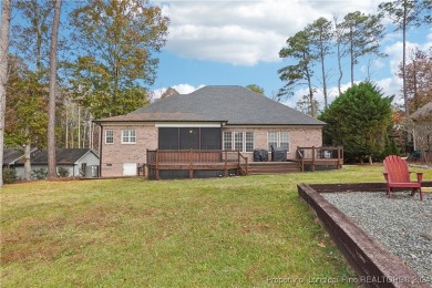 STUNNING CUSTOM HOME located on the 12th hole of Carolina Trace on Carolina Trace Country Club in North Carolina - for sale on GolfHomes.com, golf home, golf lot