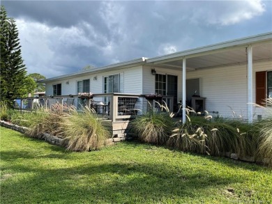 This charming residence boasts numerous delightful features. 2 on Indianwood Golf and Country Club in Florida - for sale on GolfHomes.com, golf home, golf lot
