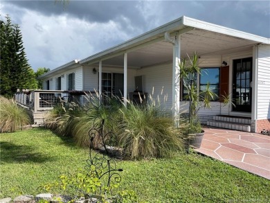 This charming residence boasts numerous delightful features. 2 on Indianwood Golf and Country Club in Florida - for sale on GolfHomes.com, golf home, golf lot