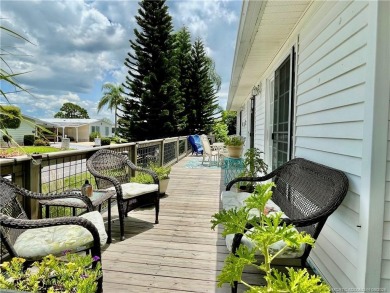 This charming residence boasts numerous delightful features. 2 on Indianwood Golf and Country Club in Florida - for sale on GolfHomes.com, golf home, golf lot