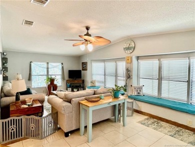 This charming residence boasts numerous delightful features. 2 on Indianwood Golf and Country Club in Florida - for sale on GolfHomes.com, golf home, golf lot