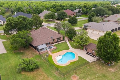 Private paradise nestled along the river with water views on Pecan Plantation Country Club in Texas - for sale on GolfHomes.com, golf home, golf lot