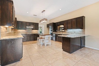 Private paradise nestled along the river with water views on Pecan Plantation Country Club in Texas - for sale on GolfHomes.com, golf home, golf lot
