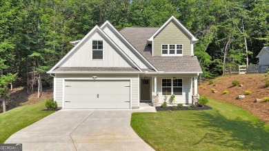 Discover the charm of this nearly new 2023 craftsman-style home on The Highlands Course at Lake Arrowhead in Georgia - for sale on GolfHomes.com, golf home, golf lot