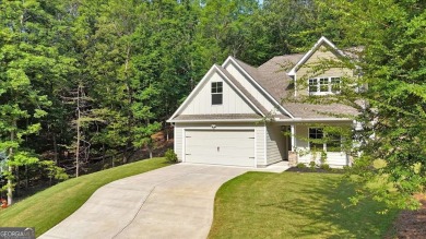 Discover the charm of this nearly new 2023 craftsman-style home on The Highlands Course at Lake Arrowhead in Georgia - for sale on GolfHomes.com, golf home, golf lot