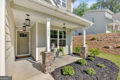 Discover the charm of this nearly new 2023 craftsman-style home on The Highlands Course at Lake Arrowhead in Georgia - for sale on GolfHomes.com, golf home, golf lot