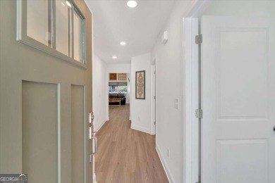 Discover the charm of this nearly new 2023 craftsman-style home on The Highlands Course at Lake Arrowhead in Georgia - for sale on GolfHomes.com, golf home, golf lot