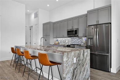 PRIME WATERFRONT IN CAPE CORAL! CONTEMPORARY 3 BEDROOM PLUS DEN on Burnt Store Golf Club in Florida - for sale on GolfHomes.com, golf home, golf lot