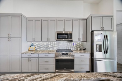 PRIME WATERFRONT IN CAPE CORAL! CONTEMPORARY 3 BEDROOM PLUS DEN on Burnt Store Golf Club in Florida - for sale on GolfHomes.com, golf home, golf lot