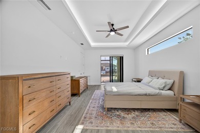 PRIME WATERFRONT IN CAPE CORAL! CONTEMPORARY 3 BEDROOM PLUS DEN on Burnt Store Golf Club in Florida - for sale on GolfHomes.com, golf home, golf lot