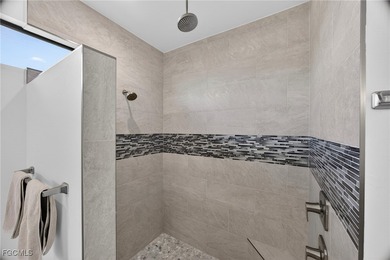 PRIME WATERFRONT IN CAPE CORAL! CONTEMPORARY 3 BEDROOM PLUS DEN on Burnt Store Golf Club in Florida - for sale on GolfHomes.com, golf home, golf lot