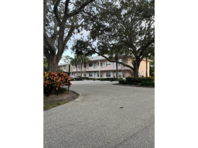 Nestled in the Parkside area of Little Club, this first floor on The Little Club in Florida - for sale on GolfHomes.com, golf home, golf lot