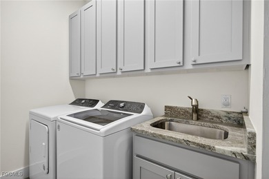 PRIME WATERFRONT IN CAPE CORAL! CONTEMPORARY 3 BEDROOM PLUS DEN on Burnt Store Golf Club in Florida - for sale on GolfHomes.com, golf home, golf lot