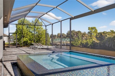 PRIME WATERFRONT IN CAPE CORAL! CONTEMPORARY 3 BEDROOM PLUS DEN on Burnt Store Golf Club in Florida - for sale on GolfHomes.com, golf home, golf lot