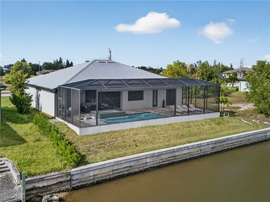 PRIME WATERFRONT IN CAPE CORAL! CONTEMPORARY 3 BEDROOM PLUS DEN on Burnt Store Golf Club in Florida - for sale on GolfHomes.com, golf home, golf lot