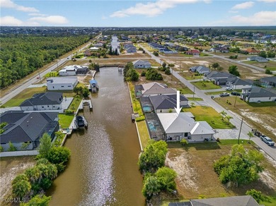 PRIME WATERFRONT IN CAPE CORAL! CONTEMPORARY 3 BEDROOM PLUS DEN on Burnt Store Golf Club in Florida - for sale on GolfHomes.com, golf home, golf lot