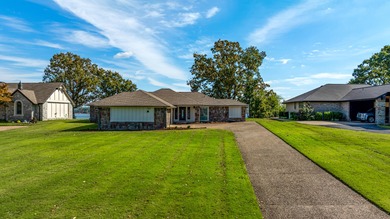 33024 Mockingbird Lane is a striking lakefront retreat that on The Coves Golf Course in Oklahoma - for sale on GolfHomes.com, golf home, golf lot