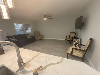 Best location three miles to the beach and surrounded by stores on Kings Point Golf -Flanders Way in Florida - for sale on GolfHomes.com, golf home, golf lot