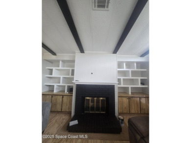 Partially renovated home is ready for handy owners or landlord on Barefoot Bay Golf Course in Florida - for sale on GolfHomes.com, golf home, golf lot