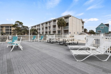 Perched on the top floor and situated at the end of the building on Surf Golf and Beach Club in South Carolina - for sale on GolfHomes.com, golf home, golf lot