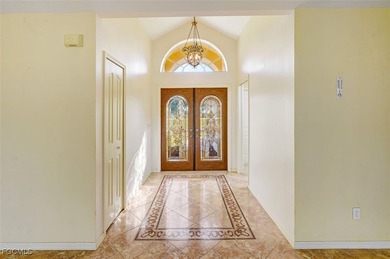 Welcome to your Florida dream home! Tucked away on a quiet on Coral Oaks Golf Course in Florida - for sale on GolfHomes.com, golf home, golf lot
