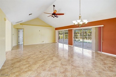 Welcome to your Florida dream home! Tucked away on a quiet on Coral Oaks Golf Course in Florida - for sale on GolfHomes.com, golf home, golf lot