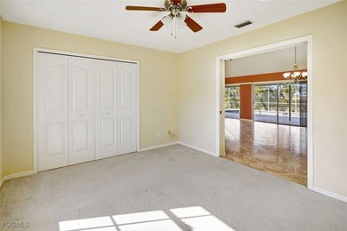 Welcome to your Florida dream home! Tucked away on a quiet on Coral Oaks Golf Course in Florida - for sale on GolfHomes.com, golf home, golf lot