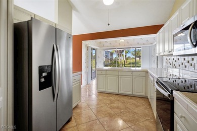 Welcome to your Florida dream home! Tucked away on a quiet on Coral Oaks Golf Course in Florida - for sale on GolfHomes.com, golf home, golf lot