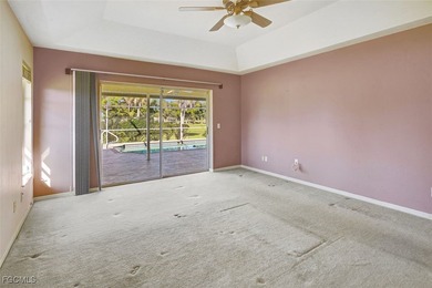 Welcome to your Florida dream home! Tucked away on a quiet on Coral Oaks Golf Course in Florida - for sale on GolfHomes.com, golf home, golf lot