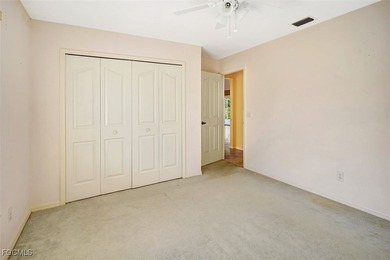 Welcome to your Florida dream home! Tucked away on a quiet on Coral Oaks Golf Course in Florida - for sale on GolfHomes.com, golf home, golf lot