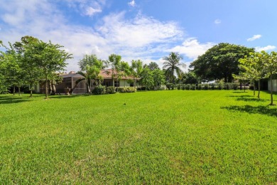 Welcome to single level living, plenty of privacy! Located on Banyan Golf Club in Florida - for sale on GolfHomes.com, golf home, golf lot