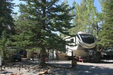Extra large corner lot, with mature trees.  2021 36 foot Grand on Star Valley RV Golf Course in Wyoming - for sale on GolfHomes.com, golf home, golf lot