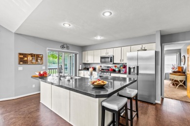 Welcome to your dream home in Canadian Lakes, perfectly situated on Canadian Lakes Country Club-The Royal Course in Michigan - for sale on GolfHomes.com, golf home, golf lot