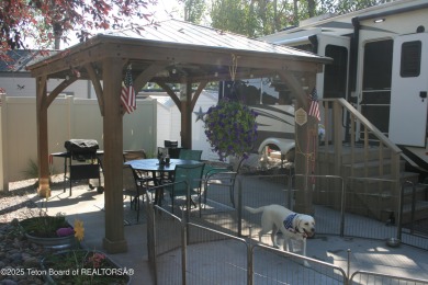Extra large corner lot, with mature trees.  2021 36 foot Grand on Star Valley RV Golf Course in Wyoming - for sale on GolfHomes.com, golf home, golf lot