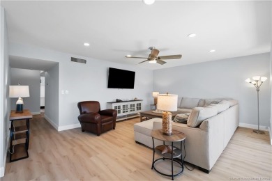 Situated in Port Salerno and in close proximity to downtown on Miles Grant Country Club in Florida - for sale on GolfHomes.com, golf home, golf lot