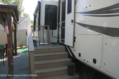 Extra large corner lot, with mature trees.  2021 36 foot Grand on Star Valley RV Golf Course in Wyoming - for sale on GolfHomes.com, golf home, golf lot