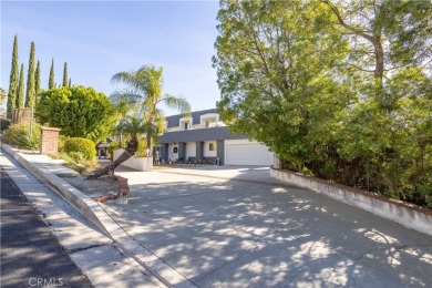 This beautiful home is nestled amidst gently rolling hills in on Knollwood Golf Club in California - for sale on GolfHomes.com, golf home, golf lot